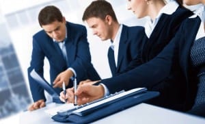 Contemporary business people working in team in the office